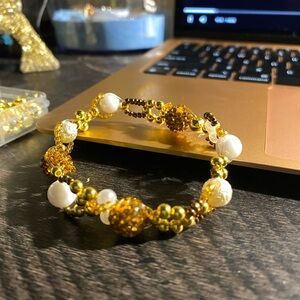 Elegant Gold and White Beaded Bracelet